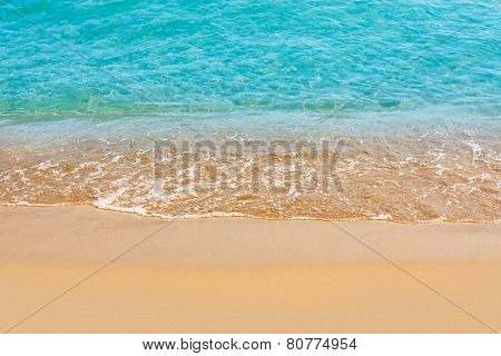 Beautiful water of the sea and yellow sand
