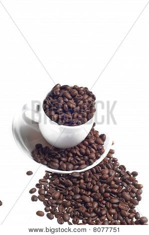 Pohár a deska s Caffee fazole