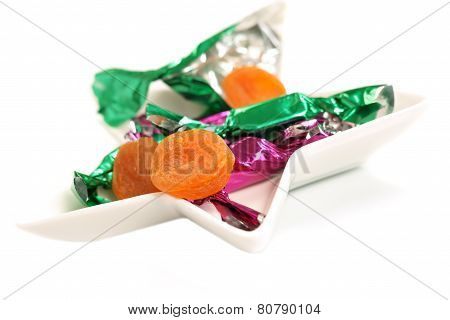 Dried apricot in a candy wrapper