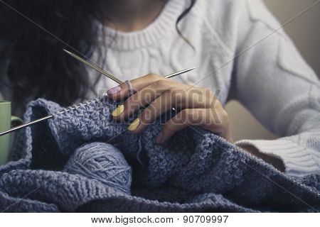 Blue Knitting In Female Hands Closeup