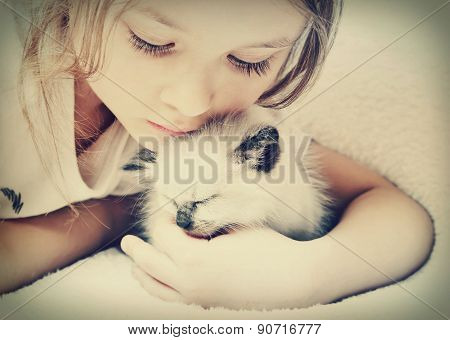 Child And Kitten
