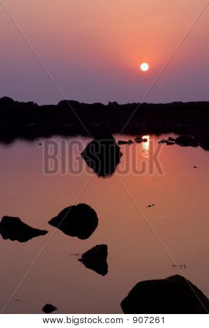 Solnedgång reflektioner i havet Utflow