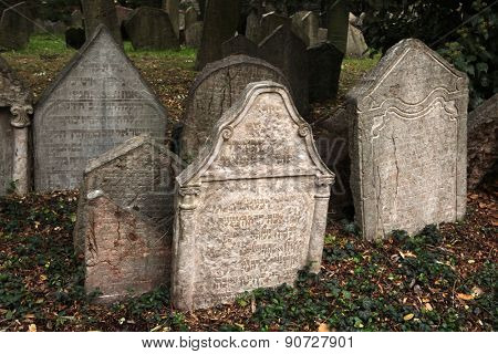 PRAGUE, CZECH REPUBLIC - OCTOBER 15, 2012: Abandoned tombstones at the Old Jewish Cemetery in Prague, Czech Republic.