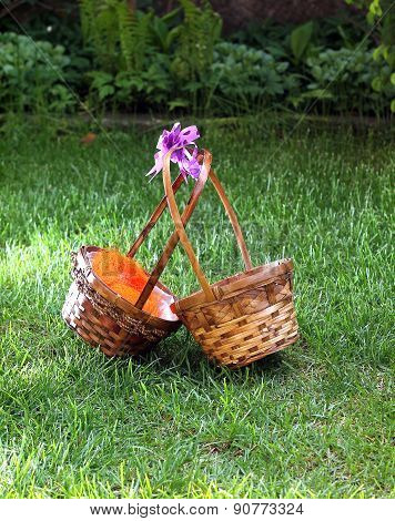 Straw basket in green grass