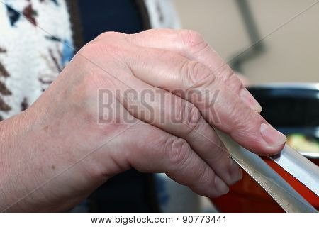 Women's Hand, Grilling Vegetables