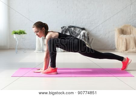 Women doing exercises aerobics warming up with gymnastics for flexibility leg stretching workout at