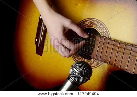 Girl Playing Guitar For Recording