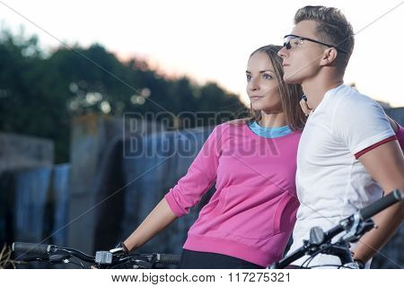 Sportive Caucasian Couple With Mtb Bicycles Dating Outdoors. Together With Mtb Bikes.