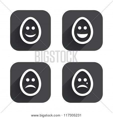 Eggs happy and sad faces signs. Easter icons.