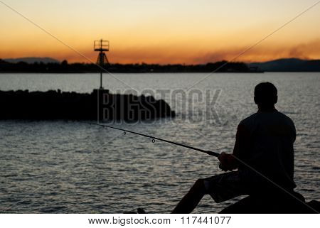 Fisherman at sunset