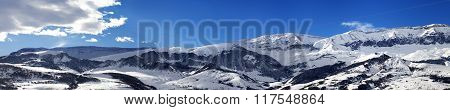 Panoramic View On Snowy Mountains At Nice Sun Day
