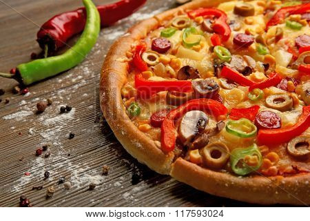 Delicious sliced pizza with vegetables, close-up
