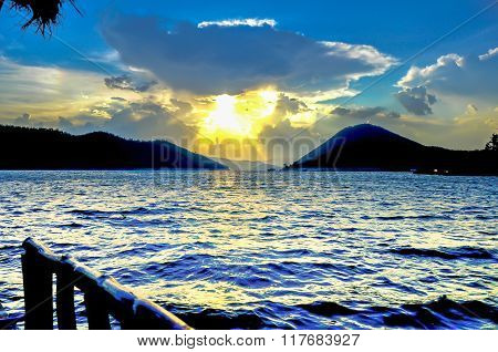 Lake with bright blue sky