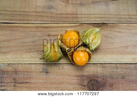 Cape Gooseberry On Wooden Background