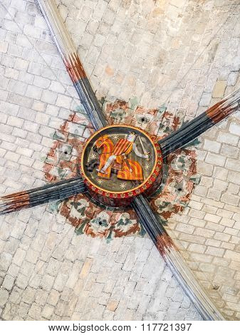 BARCELONA SPAIN - FEBRUARY 22 2015: Figures in the ceiling of Santa Maria del Mar gothic cathedral in Barcelona. The cathedral was built between 1329 and 1383.