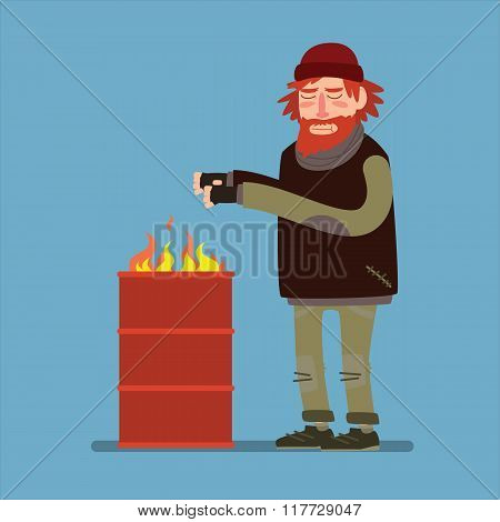 Sad homeless heated standing near barrel with fire