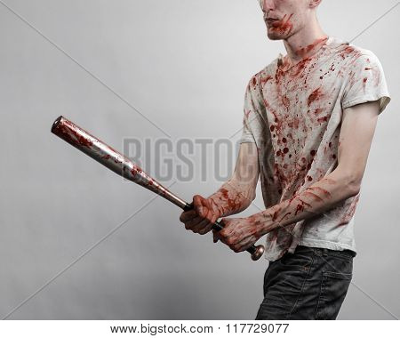 Bloody Topic: The Guy In A Bloody T-shirt Holding A Bloody Bat On A White Background