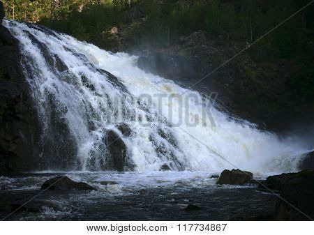 Waterfall on Kutsayoki river at Kola peninsula Russia. This waterfall is about 10 meters high.