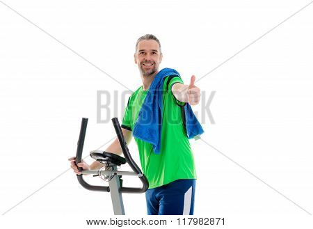 Man With Thumb Up Train With Fitness Machine