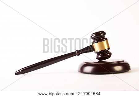 Wooden judge gavel or law hammer and soundboard isolated on white background, close-up. Judgement or auction and conceptual of justice and judgements