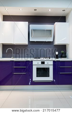purple modern kitchen interior with baking oven