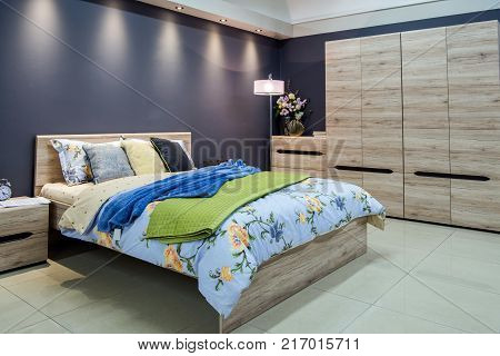 view of Cozy modern bedroom interior with furniture