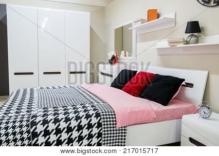 view of Cozy modern bedroom interior with furniture