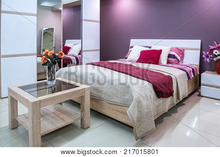 view of Cozy modern bedroom interior with furniture