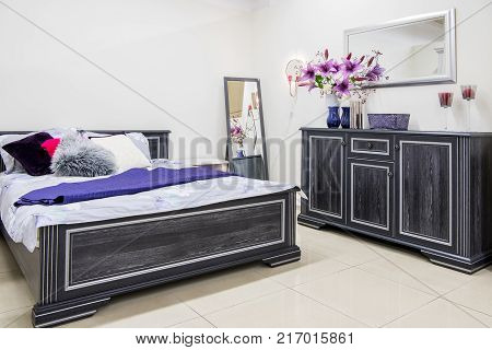 view of Cozy modern bedroom interior with furniture
