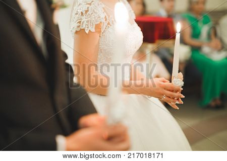 Wedding couple bide and groom get married in a church.