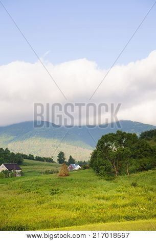 Haystack summer in the beautiful village Ukrainian Carpathians