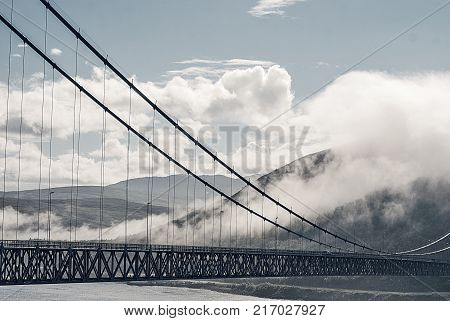 The Kvalsund Bridge is a suspension bridge between the mainland and the island of Kvaloya, Finnmark, Norway.