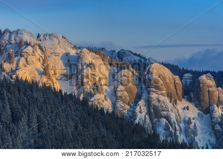 winter sunrise in the Ciucas Mountains Romania