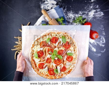 Delicious italian pizza served on wooden table