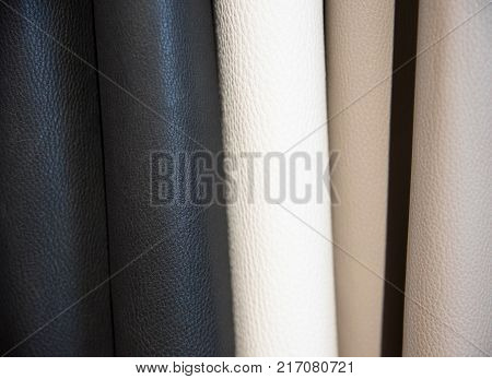 Color palette sample of leather material as a background.