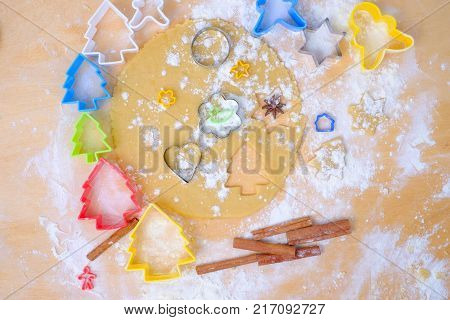 Gingerbread cookie dough and cookie cutters. Close up view. Christmas holiday baking concept