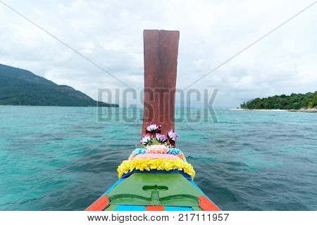 long tailed boat fishing boat motor boat on the blue sea