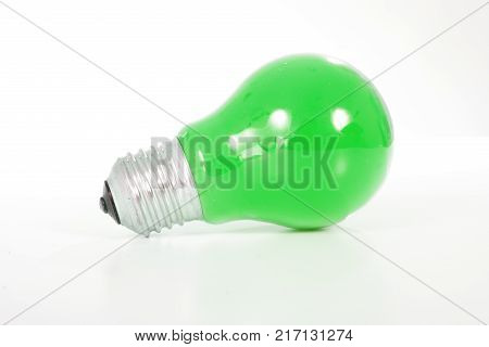 Green light bulb. Classic shape bulb with green color..