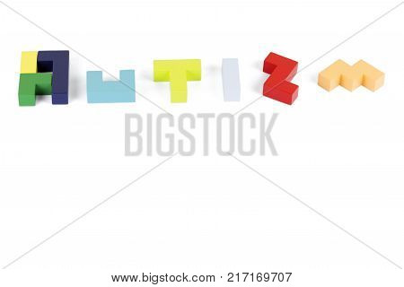 Letters of the word autism on a white background with copy space. Autism on isolation with space for text. World Day for the dissemination of information on the problem of autism.