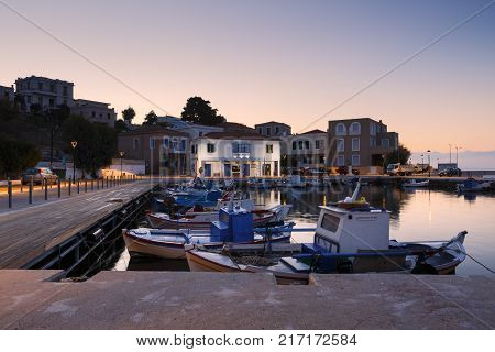 INOUSES, GREECE - NOVEMBER 10, 2017: Early morning view of the harbour on Inouses island in Greece on November 10, 2017.