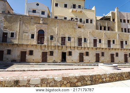 Old Houses And Stone Fence On The Island Of Crete.