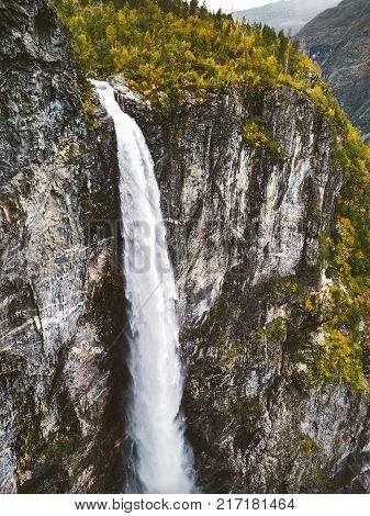 Vettisfossen Waterfall is the highest free fall in Norway Landscape at rocky mountains Travel serene scenic aerial view wild nature
