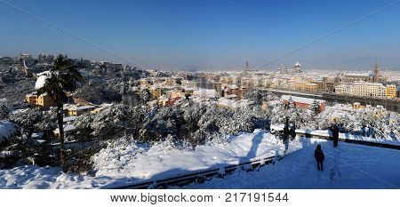 Beautiful cityscape of Florence after a snowfall as seen from Piazzale Michelangelo. Italy