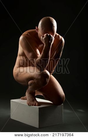 studio portrait of athletic man. Body skulptur