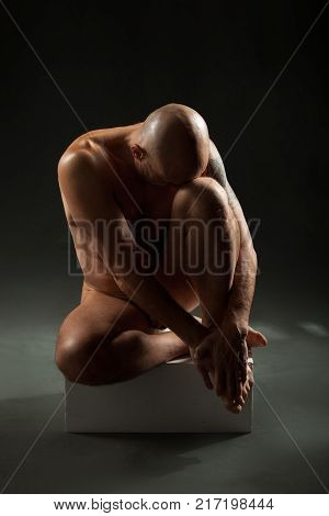 studio portrait of athletic man. Body skulptur
