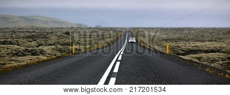 Highway N1 through Iceland landscape at foggy day. Long banner