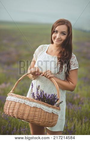 Beautifull Brunette Buxom Nubile Lady Woman With Deep Blue Eyes Posing On Field Of Spring Lavender W
