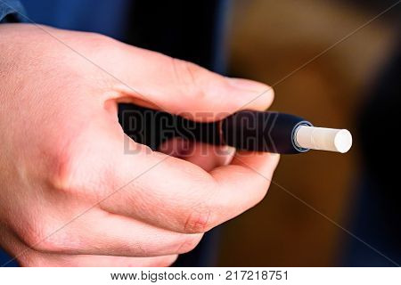 New technology of electronic cigarettes, system of heating of tobacco or IQOS