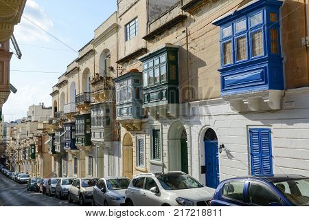 The Traditional Maltese Colorful Wooden Balconies In Sliema On Malta