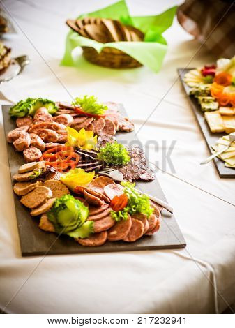the sausage plate with salami, ham, tomatoes